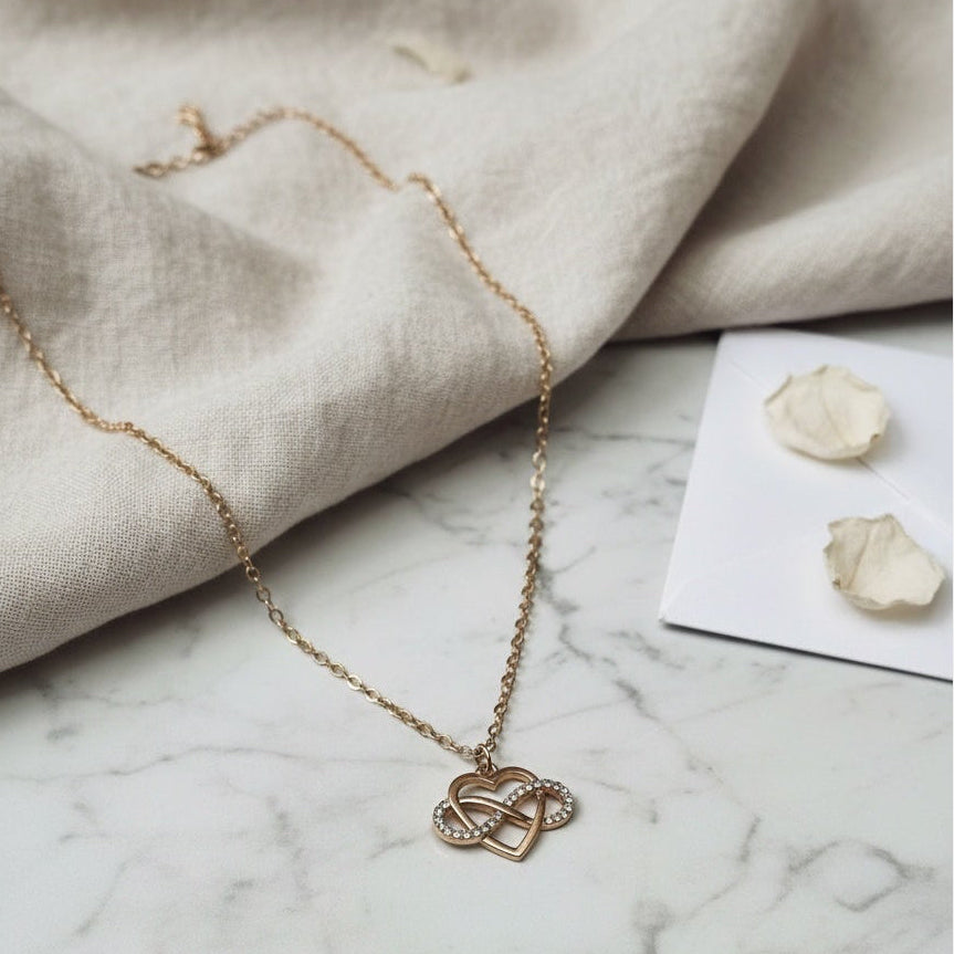 Gold Diamante Open Heart Infinity Pendant Necklace by Lovisa