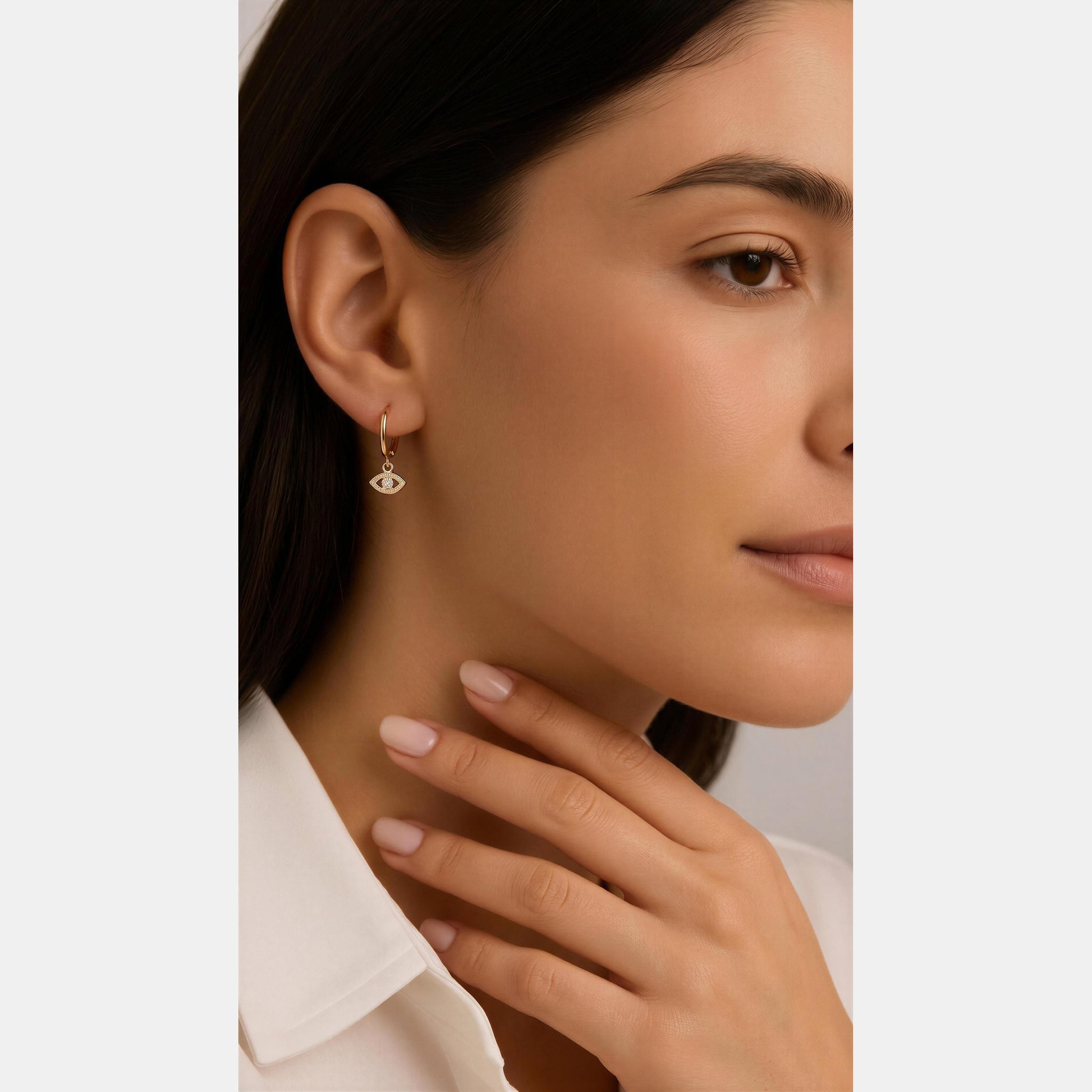 Gold Diamante Eye Drop Huggie Earrings by Lovisa